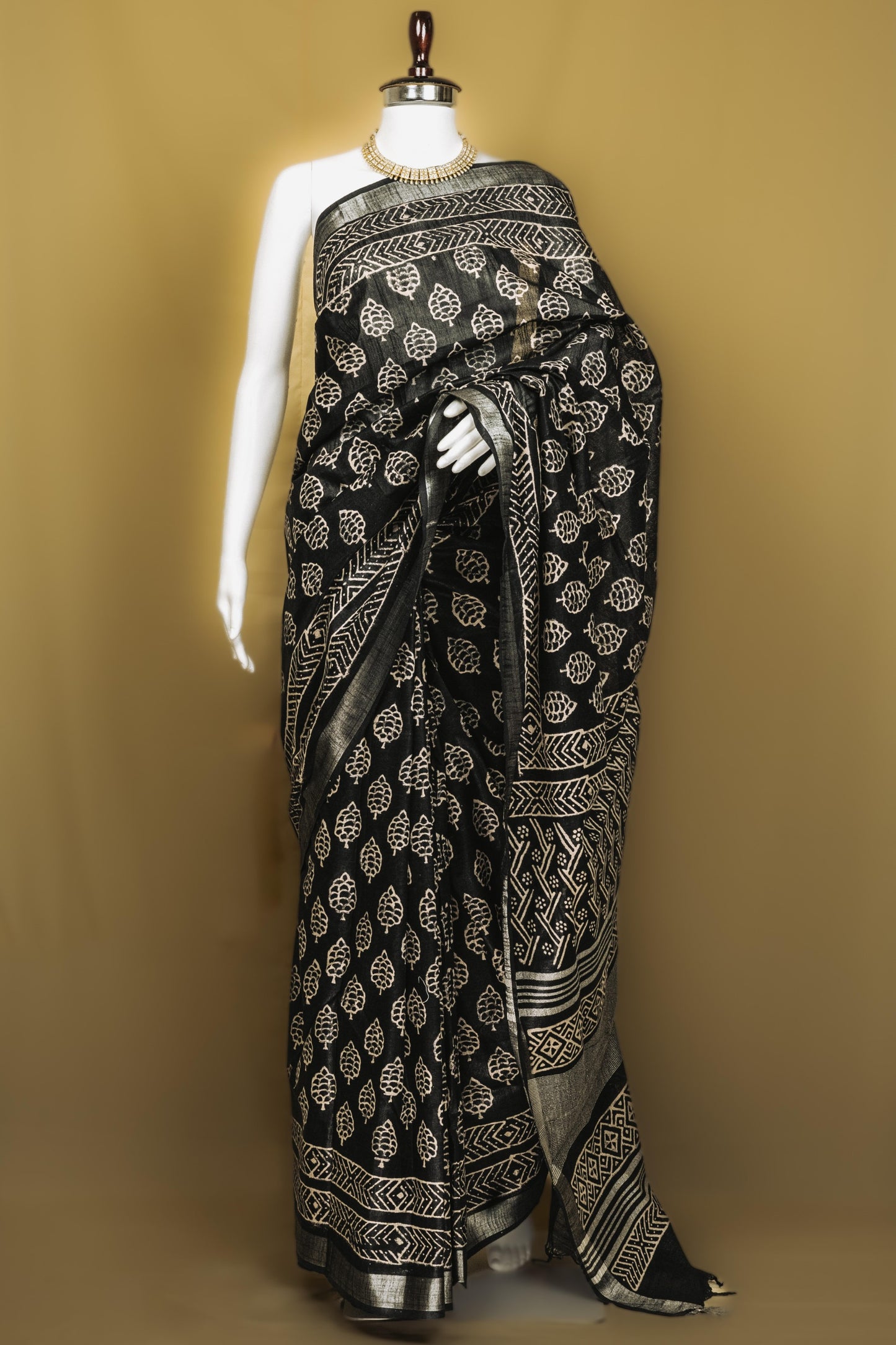 Sutrayan Tribal Muse - Handwoven Black Linen Chanderi Silk Saree with Silver Leaf Motifs