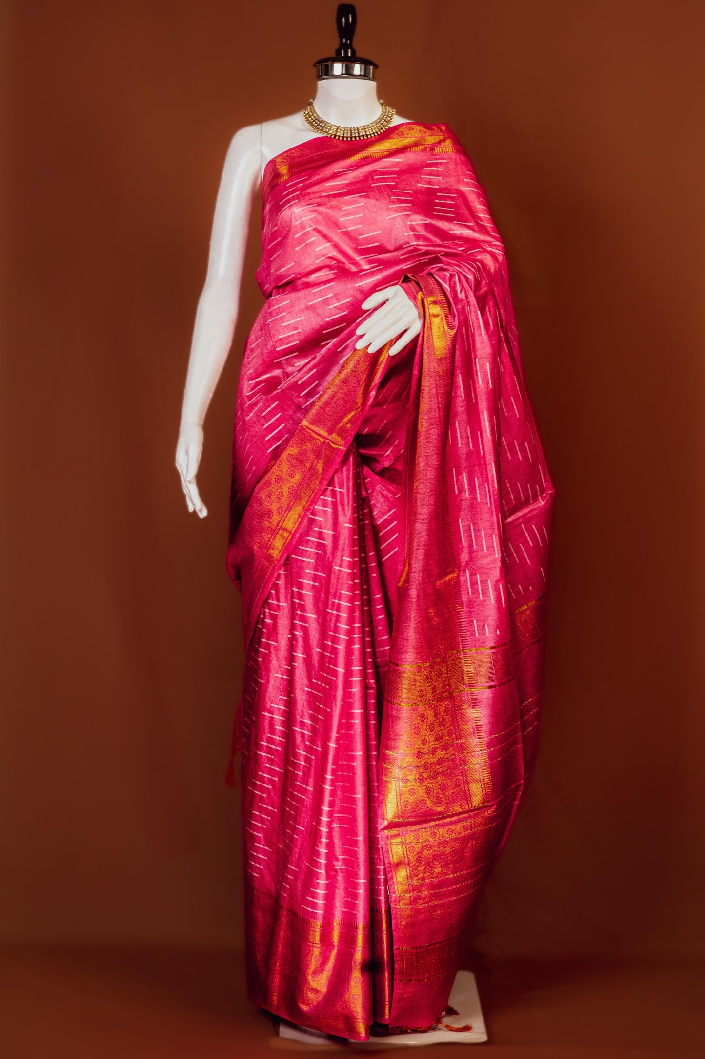 Sutrayan Blossom - Handwoven Pink Silk Saree with Golden Ikat-lnspired Zari Accents