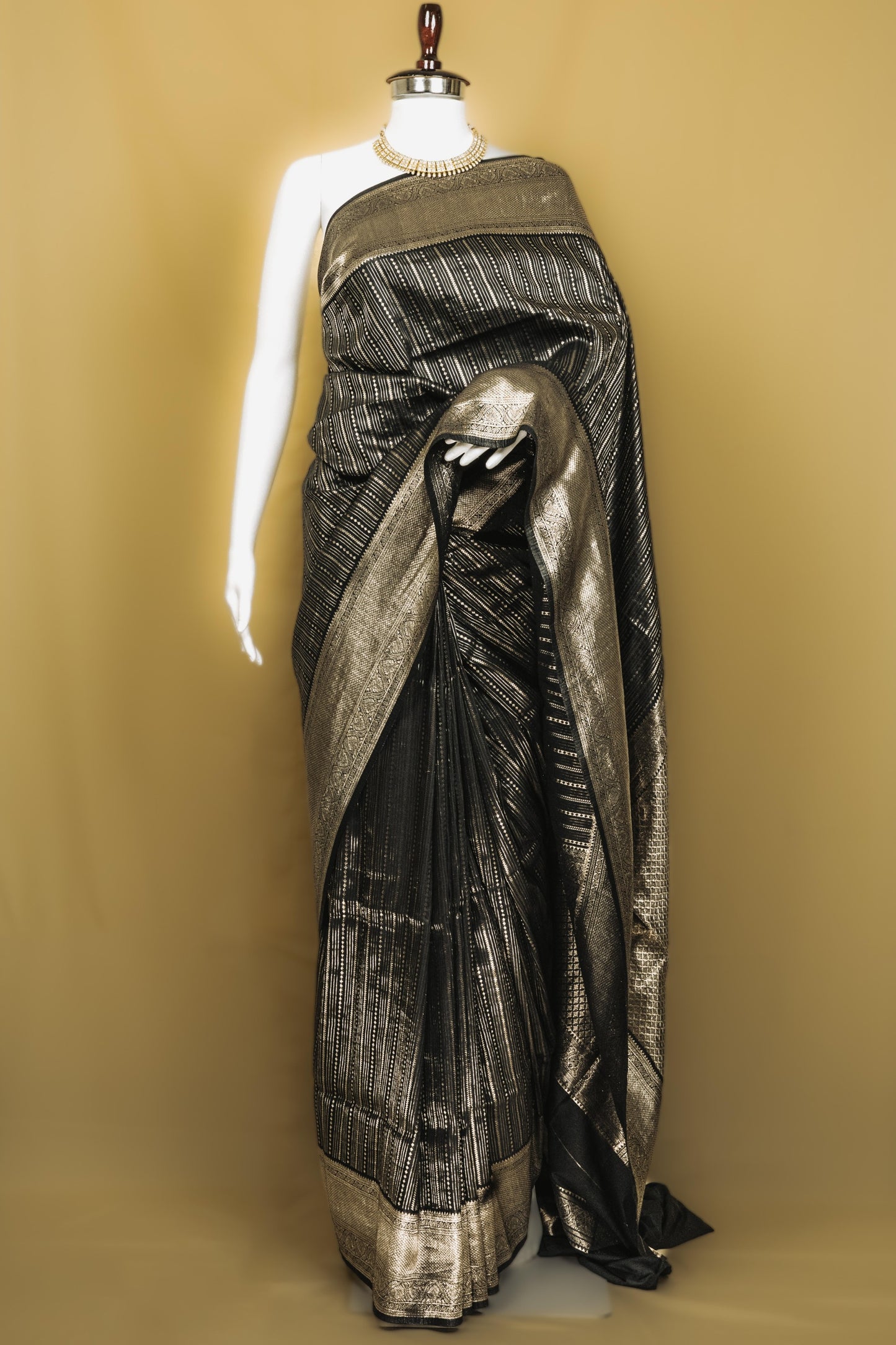 Sutrayan Noir Luxe — Handwoven Black Silk Saree with Antique Gold Zari Stripes